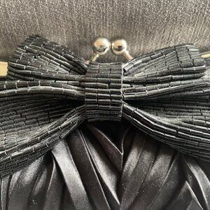 Satin evening clutch / handbag, in black